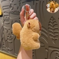 Brown capybara plush keychain with pull string mechanism and flapping wings feature - Pull String Moving Wings Capybara