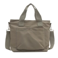 Khaki nylon bucket tote bag with front snap pocket and adjustable crossbody strap - Light Green