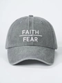 Detailed view of white Faith over Fear embroidery on washed dark gray cotton baseball cap - Adjustable / Gray