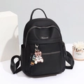 Modern black oxford cloth backpack for women with cute bear pendant and silver brand logo - Large / Black