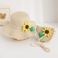 Detailed view of children's straw sun hat and matching bag set with sunflower. - Hat And Crossbody Bag / Beige
