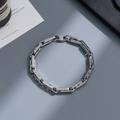 Detailed top view of a minimalist silver stainless steel geometric link chain bracelet - gf102-Geometric Ring Design