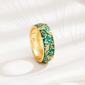 Detail of gold floral ring with green enamel, leaf patterns and sparkling crystals - US 6 / Green