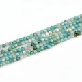 Polished 4mm natural hemimorphite round beads in a light blue and white multi-layer strand - 4mm / Blue