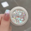 Macro detail of Jade Bamboo opal nail powder with iridescent aurora sequins on long nails - Yuzhu (No. 05 High Shine Aurora Opal Powder)