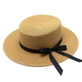 Close-up of a classic straw boater hat featuring a stylish black grosgrain ribbon bow - Khaki