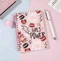 Close-up of pink spiral notebook with girl power patterns and pink plush pendant - Pink GRL PWR