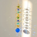 Macro detail of golden spiral wind chime casting colorful rainbow spots on the wall - Gold Spiral Medium Blue Crystal Ball