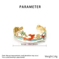Detail of ocean-themed gold stainless steel cuff with starfish and palm tree enamel charms - Mermaid Ocean Style (KB207730-SP)
