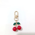 Handmade gold cherry pendant keychain with red resin fruit and green leaf alloy accessory - Red Cherry Glossy Charm (Cherry A-G)