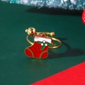 Macro view of gold stainless steel ring with a red Christmas stocking oil drop charm - Christmas Sock Pendant Stainless Steel Ring (9987)