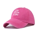 Detail of washed cotton pink baseball cap with vintage finish and embroidered text - Adjustable / Rose Red (and suck)