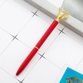 Elegant red metal ballpoint pen with a large crystal diamond topper and golden accents - Red