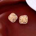 Detailed close-up of square zircon stud earrings with gold plating on red silk background - Gold (S925 Silver Pin)
