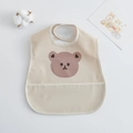 Waterproof baby bib in beige featuring a brown bear print and large food catcher pocket - Pu Bib (double-layered) - Beige-edged Heart-shaped Bear / One Size