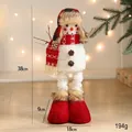 38cm Plüsch-Schneemann-Weihnachtsfigur mit rot-kariertem Hut und Zapfen-Details - Langbeiniger Schneemann mit Uschanka-Mütze