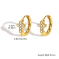 Detail view of gold hoop earrings with crystal pavé cross charms and size dimensions - Cross