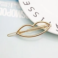Minimalist gold lip-shaped hollow metal hair clip for women featuring a polished finish - Gold Lip