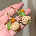 2511173f Green Beaded Walnut Pendant