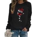 Detailed view of women's Christmas sweatshirt featuring a glittery red wine glass print - Black