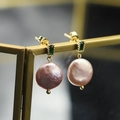 Baroque earrings featuring pink irregular pearls and green emerald gemstone accents - Emerald Pink Purple Studs