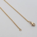 Detailed close-up of golden stainless steel cable chain necklace with lobster clasp - 1.6mm Width / 45cm Length / Gold