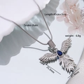 Silver phoenix wing necklace with a blue teardrop stone on a sleek snake chain - Silver Feather Wing with Blue Zirconia