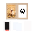 Close-up of DIY wooden pet paw print memorial kit with ink pad and photo frame - Natural Wood Color