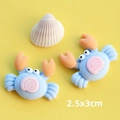 Dettaglio di ciondoli a forma di granchio in resina blu 2,5x3cm per accessori fai da te - Granchio Blu