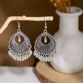 Detail of vintage silver hollow teardrop earrings with metal bead tassels hanging on wood - E2874-24/Beaded Teardrop Tassel