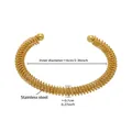 Detailed view of golden stainless steel spiral bangle with size dimensions and measurements - One Size / Spiral Winding Bead Style (Z164) / Gold