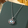 Silver Evil Eye necklace with colorful gemstones and white zircons on jewelry box - A8-Silver