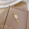 Close-up of golden tulip necklace with iridescent white flower and zircon leaf details - Tulip Pendant Titanium Steel Chain (B329)