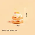 Miniatur-Sahnekuchen-Schlüsselanhänger mit gelber Kirsche und rosa Band für DIY-Deko - Cupcake / Orange