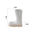 White boot shaped ceramic planter with beige textured sole and size markings - Bright White