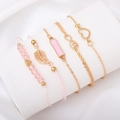 Set di quattro bracciali oro e rosa con ciondoli a cuore, foglia e simbolo dell'infinito - Set da 4 pezzi / MS8079 Rosa