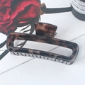 Square hollow hair claw clip with dark brown leopard pattern and glossy finish for hair styling - Glossy Light Tortoiseshell