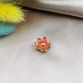 Detail of orange enamel five-petal flower pendant with gold trim on silk background - Orange Red