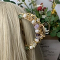 Golden hair claw clip featuring white pearls and colorful amethyst stones on blonde hair - Fluorite + Deep Sea Pearl Gold Hair Claw