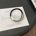 Minimalist silver-finish curved metal hair cuff with high-elastic black ponytail band - GD435 Silver Smooth Single Arc