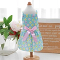 Detail view of light blue polka dot pet dress with a large pink satin bow on the back - XS / Blue