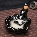 Black ceramic backflow incense burner with lotus base and flowing smoke effect - Lotus Pond Moonlight