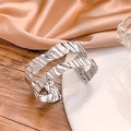 Silver open bangle bracelet with artistic irregular pleated texture and metallic finish - Silver Wrinkled Wave