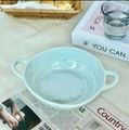 Light blue ceramic bowl with double handles for salad and soup in cozy dining scene - Blue