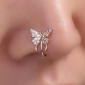 Close-up of model wearing a rose gold butterfly nose clip with shimmering crystals - Butterfly Design / Rose Gold
