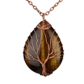 Macro detail of handmade wire-wrapped tree of life pendant with natural tiger eye stone - Tiger Eye Bronze