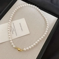 French vintage pearl necklace with a round golden magnetic clasp on a neutral background - 59# Gold White 7mm Magnetic Pearl Necklace