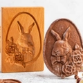 Rectangular beechwood cookie mold featuring a rabbit and rose engraving with a finished biscuit - Rabbit