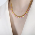 Chic gold-plated necklace with a pink star pendant worn on model with white blazer - Necklace (P1499) / 40+5cm / Pink