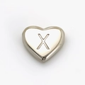 Polished silver heart-shaped stainless steel bead featuring engraved letter X - Letter X Style (SP143S-X)